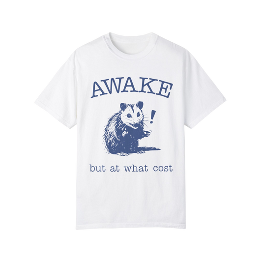 a white t - shirt that says awake but at what cost